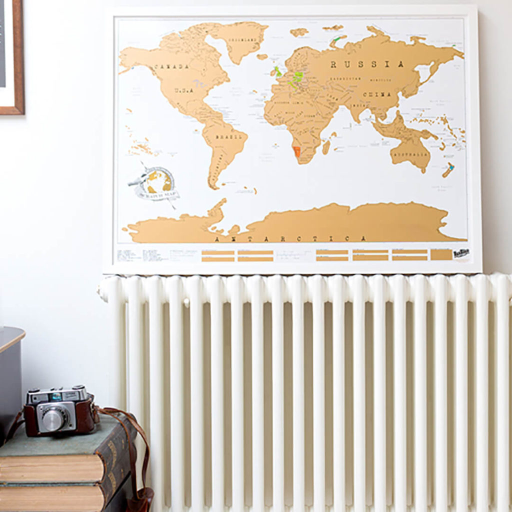 A scratch map to remember all of your trips Passport & Palmtree